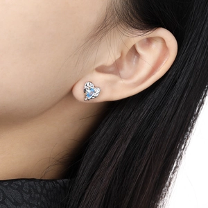 Elegant S925 sterling silver heart stud earrings featuring a sky blue gemstone center