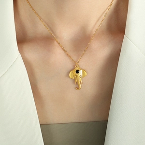 18K gold plated necklace with an elephant head pendant featuring a black bead accent