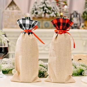 Set of two Christmas wine bottle gift bags with rustic burlap and festive plaid patterns