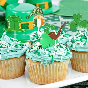 Detail of St. Patrick's Day cupcake toppers featuring leprechaun boots and clover designs
