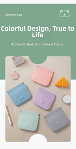 Macro detail of multi-colored silicone storage bags with squeeze closure and embossed bear