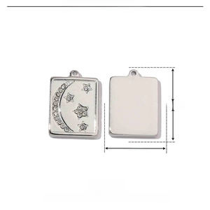 Detail view of moon and star stainless steel pendant with size and weight parameters