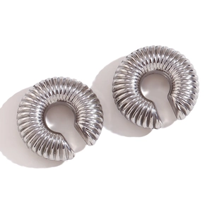 Minimalist silver stainless steel hoop earrings with textured spiral hollow design