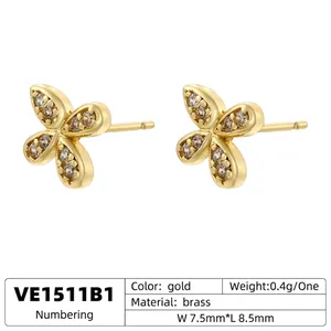 Elegant gold bow earrings with cubic zirconia butterfly design made of brass and crystals