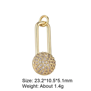 Detail view of a gold U-shaped pendant with a micro-pave zircon sphere charm for DIY jewelry