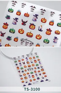 Macro detail of Halloween nail stickers with pumpkins, ghosts and bats motifs