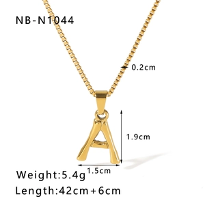Macro shot of 18k gold plated letter A pendant necklace with size measurements