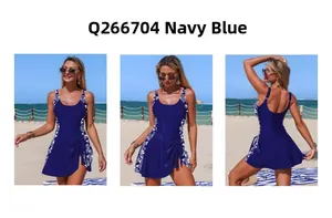 Detail of dark blue one-piece swimdress with geometric patterns and side drawstring