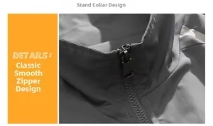 Close-up of stand-up collar and smooth metal zipper on men's windproof jacket