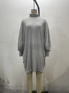 Detail of grey ribbed knit dress showing high neck collar and vertical stripe texture