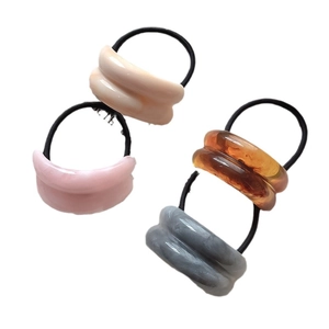 Acrylic hair ties in four colors with marble texture and double-arch resin design