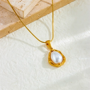 Irregular lava style gold plated stainless steel necklace with oval white pearl pendant