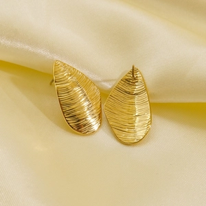 Irregular textured teardrop stud earrings in 14K gold-plated stainless steel finish