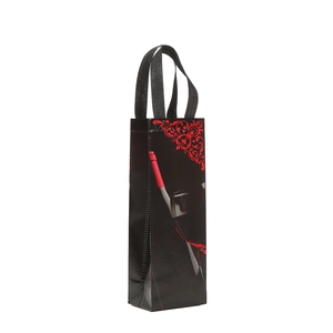 Glossy black non-woven wine gift bag with red wine bottle print and durable handles