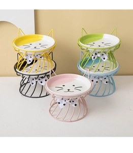 Close-up of ceramic neck-guard cat bowls in multiple colors with metal stands