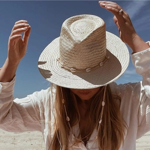 Straw Panama hat with shell band for summer beach vacation and sun protection