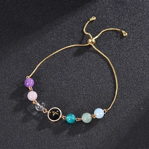 Adjustable gold chain bracelet with multicolor beads and Aries zodiac sign charm