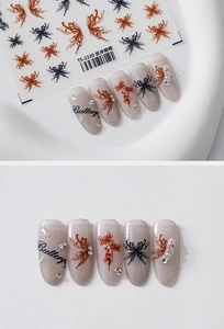 Macro detail of TS-2220 butterfly nail decals with red floral designs and pearl accents