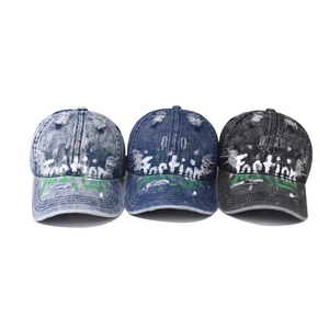 Washed denim baseball caps with graffiti fashion text and distressed ripped detailing