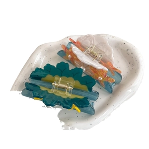 Shell and starfish acetate hair claws with pearls and green leaf style clips