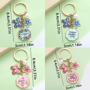 Detailed views of Mother's Day enamel keychains with pearls and floral charms