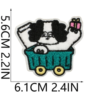 Close-up of cute cartoon puppy in blue cart embroidery patch showing size 6.1 x 5.6 cm