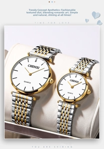 Detail of CHENXI couple watches featuring gold-silver metal straps and white dial