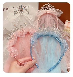 Detail of girls princess crown headbands with glitter tulle and sparkling rhinestones