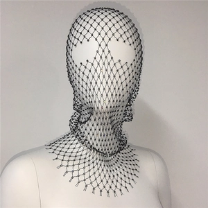 Detailed view of black rhinestone fishnet headpiece covering a mannequin head and neck