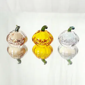 Three-piece set of Halloween crystal glass pumpkins in champagne and yellow colors
