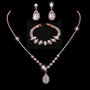 Sparkling rose gold bridal jewelry set with water drop zircons and starburst shine
