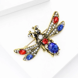 Vintage dragonfly brooch pin with colorful crystals and rhinestones on gold alloy base
