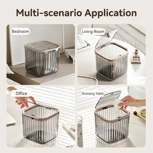 Modern grey desktop mini trash can with golden trim in four different home office settings