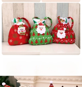 Detail of knitted Christmas drawstring bags featuring 3D Santa and snowman decorations