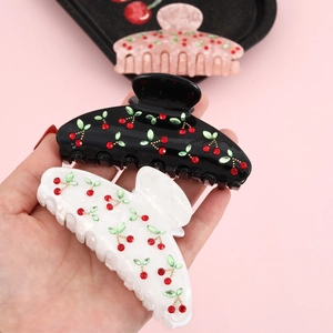 Elegant acetate cherry hair claw clips with rhinestones in black and white styles