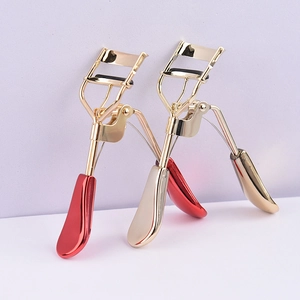 Eyelash curler set with professional gold metal frame and red ergonomic handles