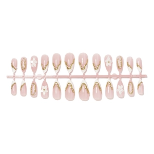French almond press-on nails with white floral patterns and gold 3D wire accents
