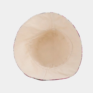 Detailed interior of sunflower bucket hat showing beige lining and clean stitching