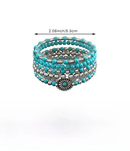 Detail view of multi-layer turquoise beaded bracelet showing dimensions and alloy texture