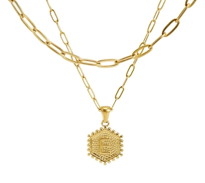 Detail of 18K gold stainless steel necklace with paperclip chain and letter E pendant