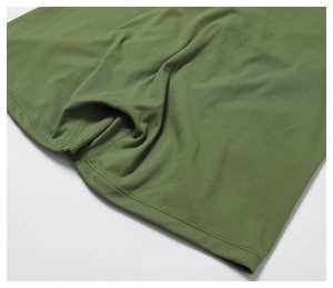 Detail of double-needle hem stitching on olive green high-density yoga pants fabric