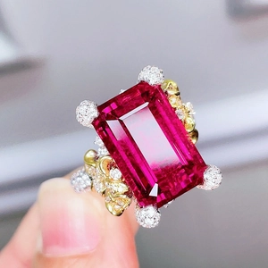 Luxury ruby gemstone ring with rectangular cut and gold floral accents for women