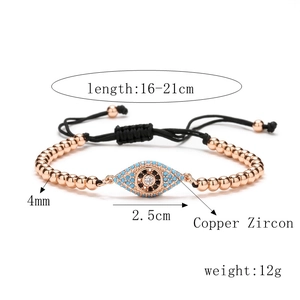 Detailed view of evil eye bracelet with copper beads and micro-set blue cubic zirconia