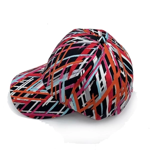 Close-up of vibrant abstract graffiti pattern and stitching on high-quality baseball cap