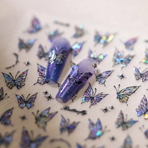 Adesivi per unghie olografici con farfalle e stelle in sfumature eleganti viola e blu