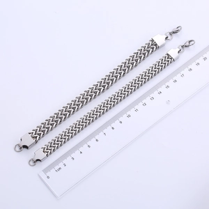 Detail shot of a silver Franco chain bracelet showing length measurement with a ruler