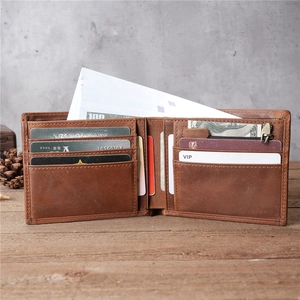 Detailed interior view of a brown vintage leather wallet with card slots and coin pocket