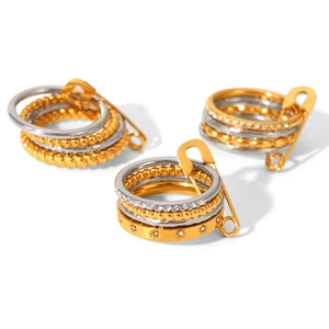 Multi-layer stackable rings set in gold and silver finish with safety pin design