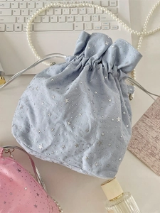 Star-patterned suede drawstring pouch bags with elegant pearl handles in pink and blue