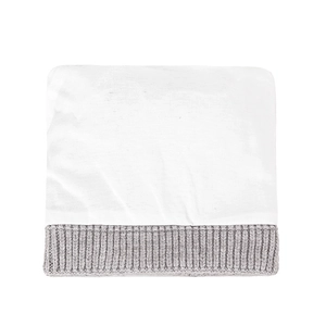 Cozy white knitted baby hat with grey ribbed cuffs and pom pom for autumn and winter